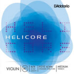 A product image of D’Addario Helicore violin strings with a blue abstract design, showing the words "HELICORE," "VIOLIN," and details like "4/4," "H310," "SET," and "MEDIUM TENSION" on the packaging.